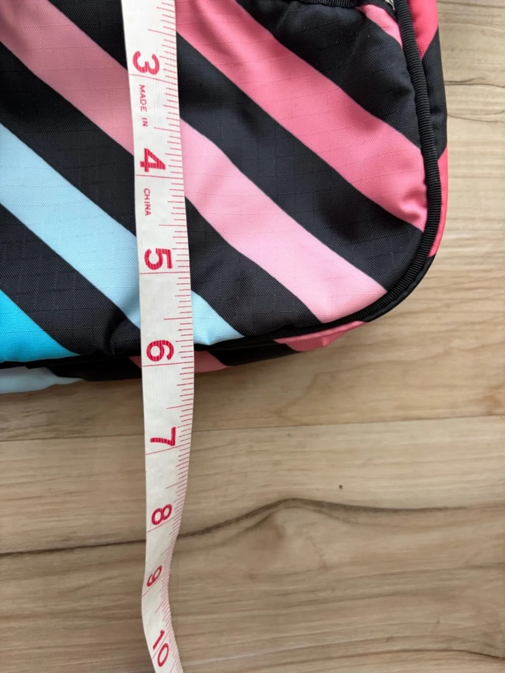 LeSportsac Black with Pink and Blue Diagonal Stripe Crossbody Bag